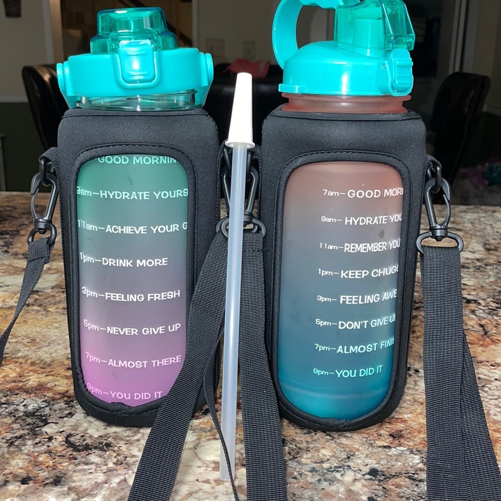 Set of 2 64 oz water bottles with neoprene sleeves